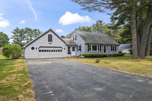 2 Wanda Ln, Gray, ME 04039 - view of front of home with driveway, a garage, a front lawn, and roof with shingles