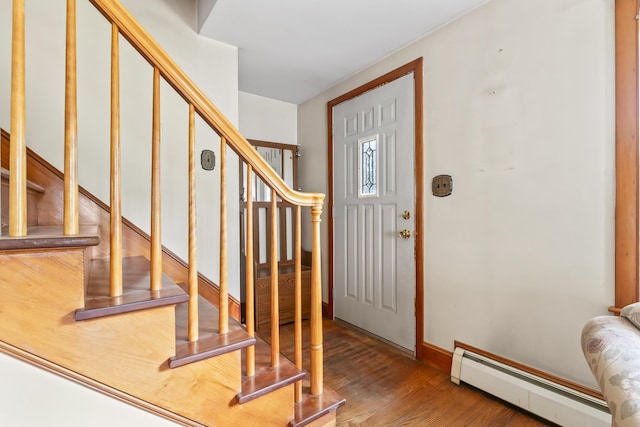 2 Wanda Ln, Gray, ME 04039 - foyer entrance featuring a baseboard heating unit, stairway, and wood finished floors