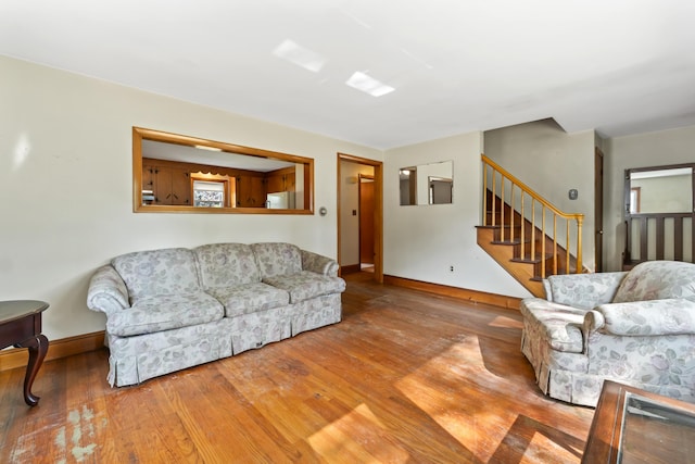 2 Wanda Ln, Gray, ME 04039 - living room featuring stairs and wood-type flooring