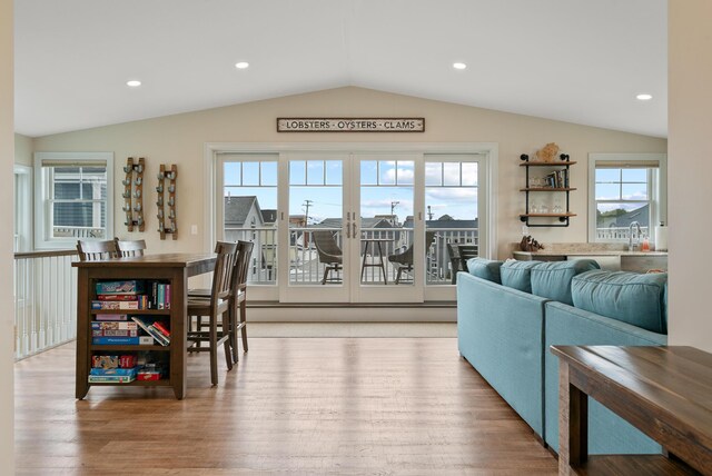 8 Studley Ln, Wells, ME 04090 - dining space with vaulted ceiling, french doors, wood finished floors, and recessed lighting