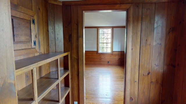 30 Wilkinson Ln, Machiasport, ME 04655 - corridor featuring wooden walls and wood finished floors