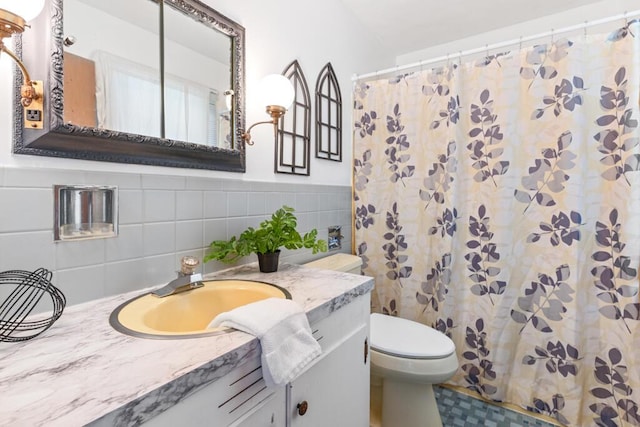 470 Main St, Waterville, ME 04901 - bathroom featuring vanity, curtained shower, and tile walls