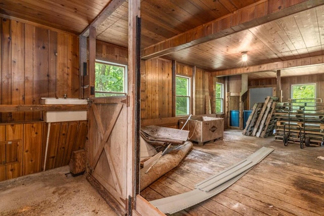 470 Main St, Waterville, ME 04901 - miscellaneous room with healthy amount of natural light, wooden walls, and wood ceiling