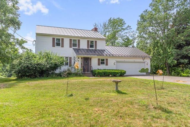 470 Main St, Waterville, ME 04901 - view of front facade featuring concrete driveway, a chimney, a standing seam roof, an attached garage, and a metal roof
