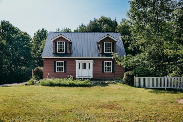 38 Swamp Rd, Bridgton, ME 04009 - view of front of home with a front lawn and a metal roof