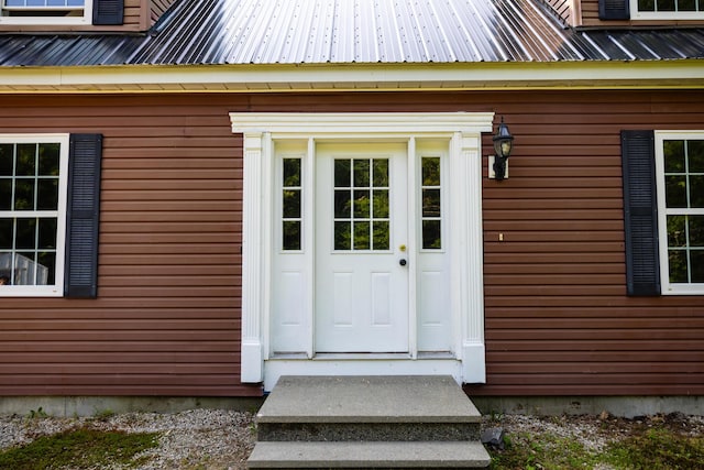 38 Swamp Rd, Bridgton, ME 04009 - entrance to property with a metal roof