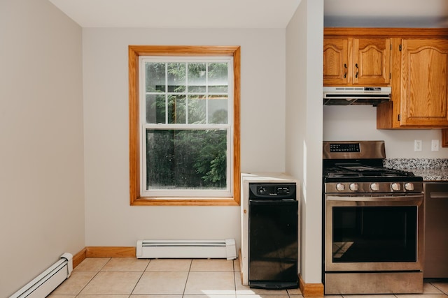 38 Swamp Rd, Bridgton, ME 04009 - kitchen featuring gas stove, baseboard heating, range hood, and light countertops