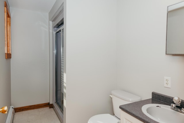 38 Swamp Rd, Bridgton, ME 04009 - bathroom featuring a baseboard heating unit, a shower stall, and vanity