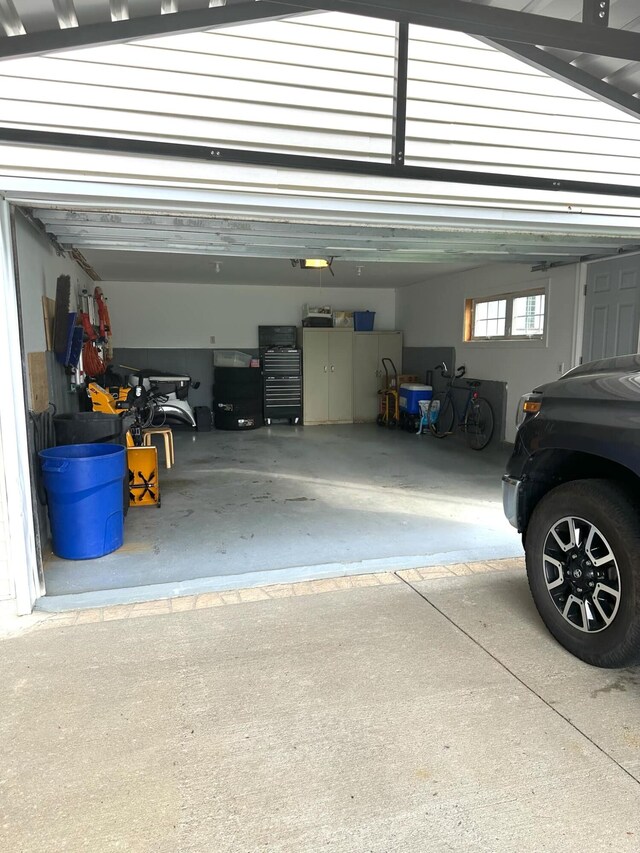 7 Lorraine Ave, Lewiston, ME 04240 - garage with a garage door opener