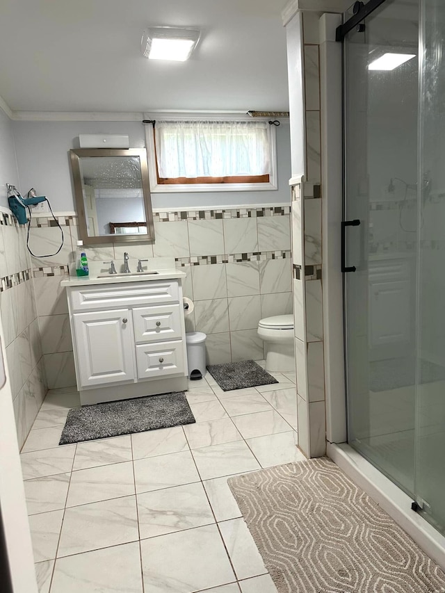 7 Lorraine Ave, Lewiston, ME 04240 - full bathroom featuring vanity, a stall shower, tile walls, and ornamental molding