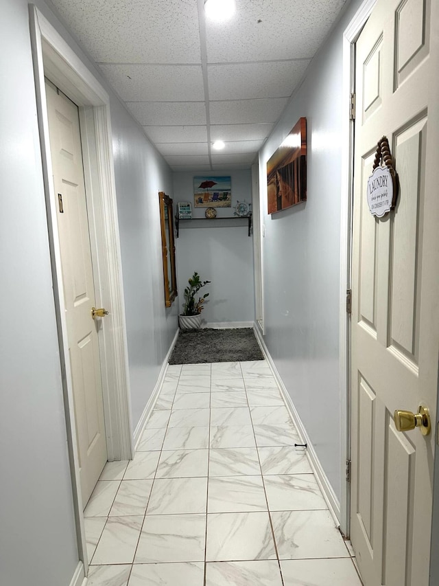 7 Lorraine Ave, Lewiston, ME 04240 - hall featuring light marble finish floors and a drop ceiling