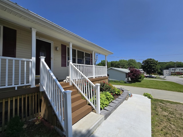 7 Lorraine Ave, Lewiston, ME 04240 - property entrance featuring a porch