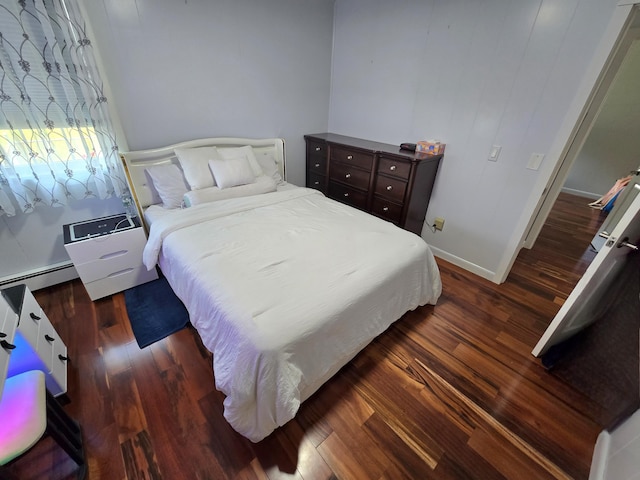 7 Lorraine Ave, Lewiston, ME 04240 - bedroom featuring dark wood finished floors and a baseboard radiator