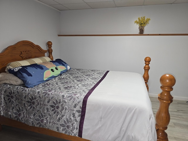 7 Lorraine Ave, Lewiston, ME 04240 - bedroom featuring wood finished floors and a drop ceiling