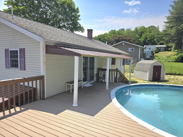 7 Lorraine Ave, Lewiston, ME 04240 - swimming pool featuring a deck and a storage unit