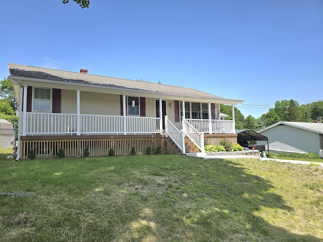 7 Lorraine Ave, Lewiston, ME 04240 - ranch-style house with a porch, a front lawn, and a carport