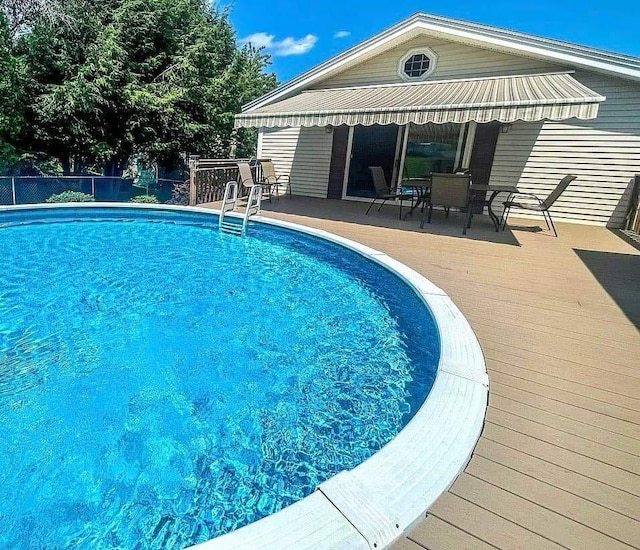 7 Lorraine Ave, Lewiston, ME 04240 - view of swimming pool featuring outdoor dining area