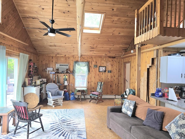 502 Cedar Lake Rd, Millinocket, ME 04462 - living room with vaulted ceiling, plenty of natural light, a ceiling fan, wooden walls, and a skylight