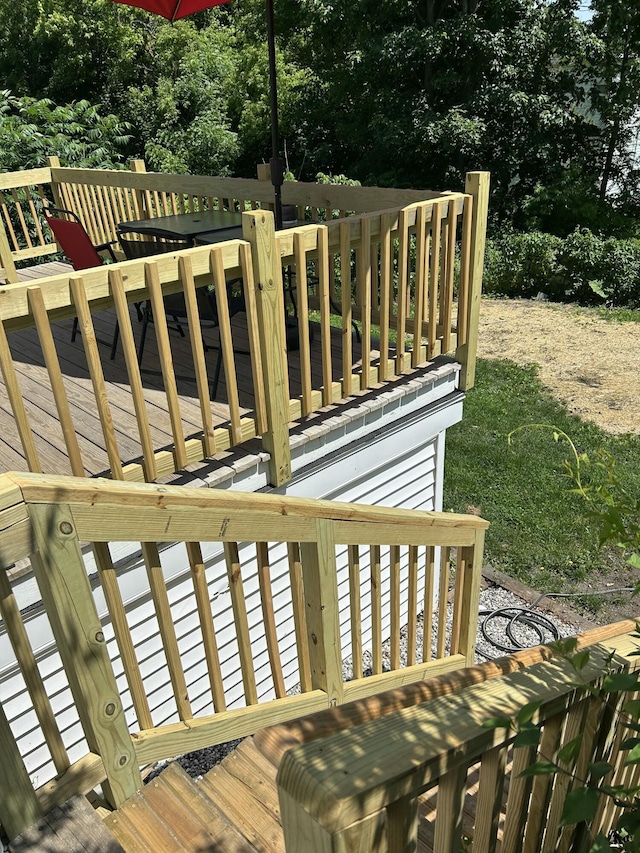 154 Cook St, Auburn, ME 04210 - wooden terrace with view of scattered trees