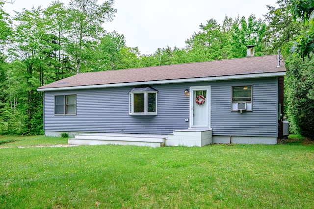 111 Rocky Rd, Woodstock, ME 04219 - view of front of home with a front yard and a shingled roof