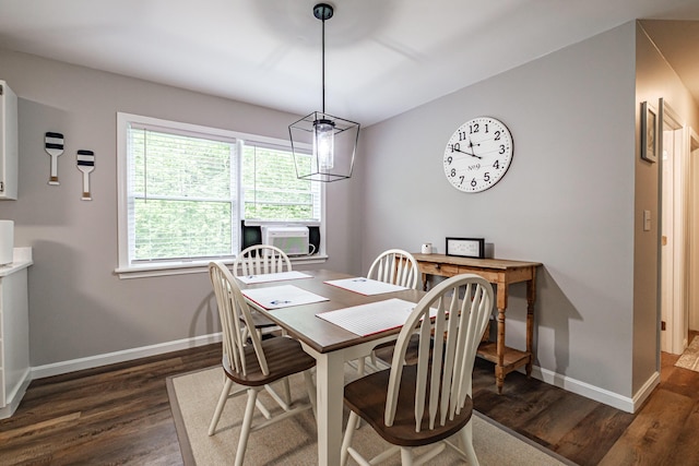 111 Rocky Rd, Woodstock, ME 04219 - dining space with dark wood-style flooring and cooling unit