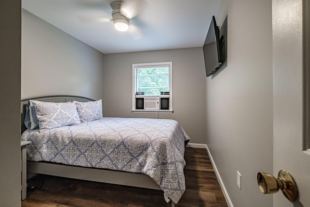 111 Rocky Rd, Woodstock, ME 04219 - bedroom with dark wood finished floors, cooling unit, and a ceiling fan