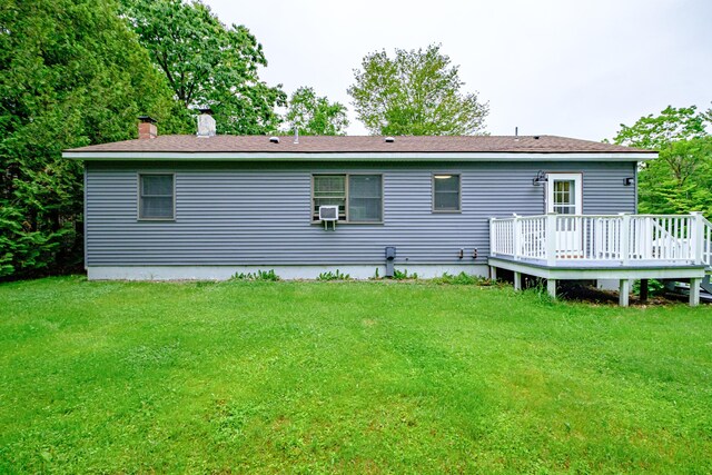 111 Rocky Rd, Woodstock, ME 04219 - back of property featuring a chimney, a deck, a yard, and cooling unit