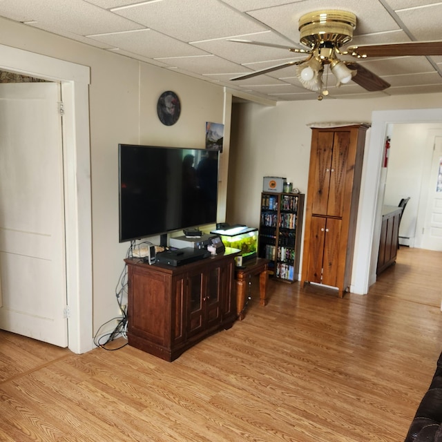 485 Main Rd, Passadumkeag, ME 04475 - living area featuring light wood-style flooring, ceiling fan, and a baseboard radiator