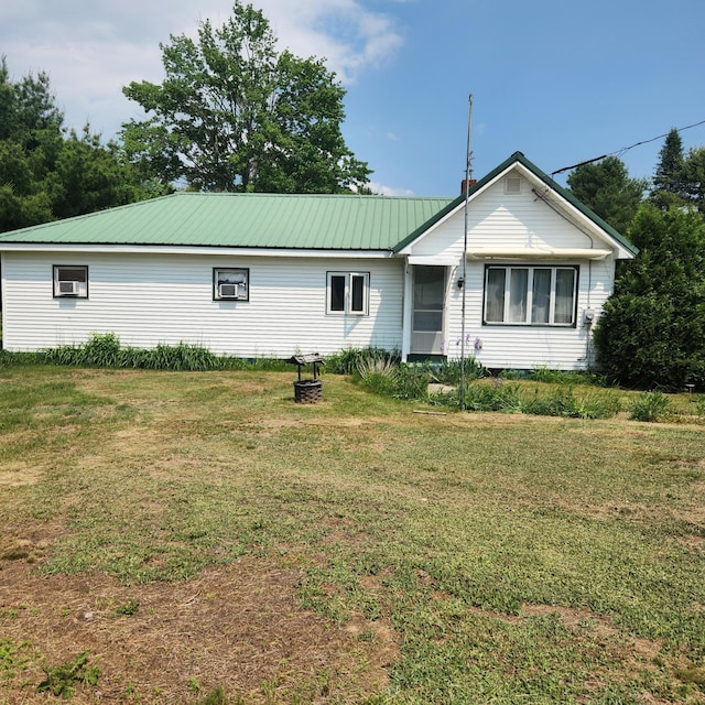 485 Main Rd, Passadumkeag, ME 04475 - view of front of house with a front yard and a metal roof