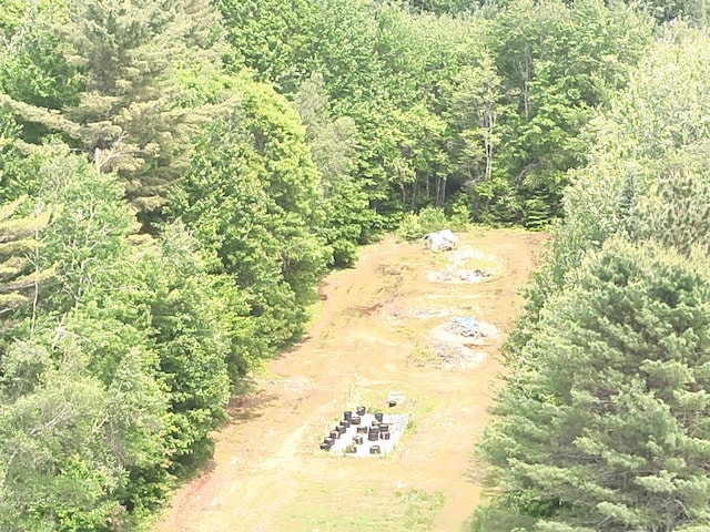 485 Main Rd, Passadumkeag, ME 04475 - aerial overview of property's location with a heavily wooded area