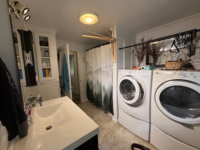 49 31st St, Shapleigh, ME 04076 - laundry room with washer and dryer and ornamental molding