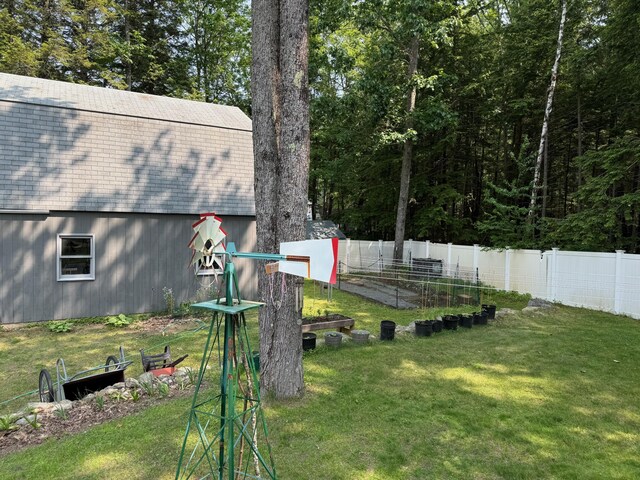 49 31st St, Shapleigh, ME 04076 - view of yard featuring a garden, an outdoor structure, and a barn