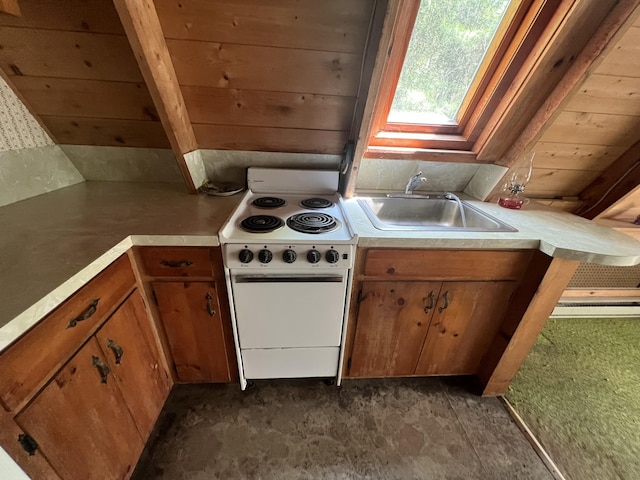20 Lemeuls Rd, Bristol, ME 04558 - kitchen with white electric stove, brown cabinetry, and light countertops