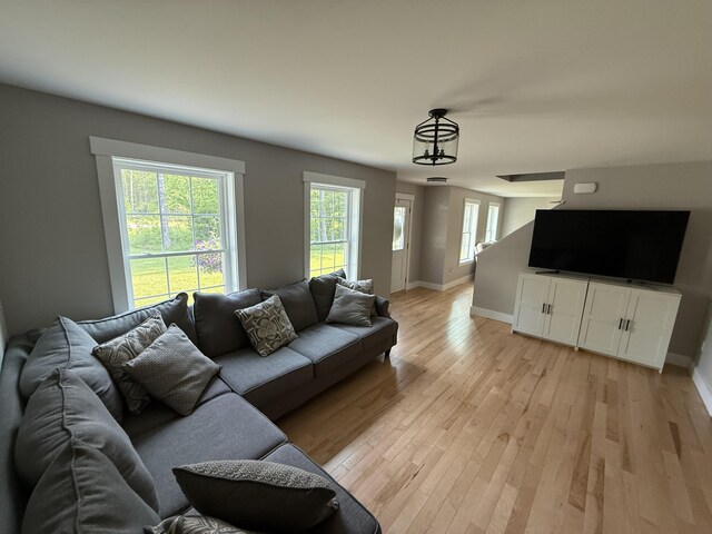 34 May Way, Sidney, ME 04330 - living room featuring light wood-type flooring and baseboards