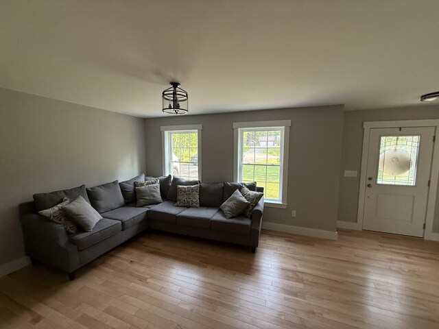 34 May Way, Sidney, ME 04330 - living room featuring light wood-style flooring and baseboards
