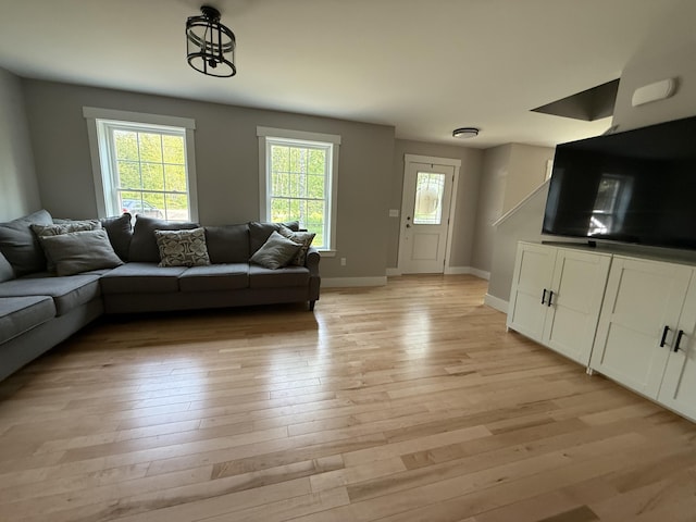 34 May Way, Sidney, ME 04330 - living area featuring light wood finished floors