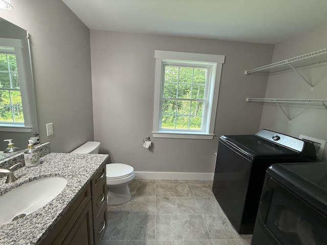 34 May Way, Sidney, ME 04330 - washroom featuring independent washer and dryer and healthy amount of natural light