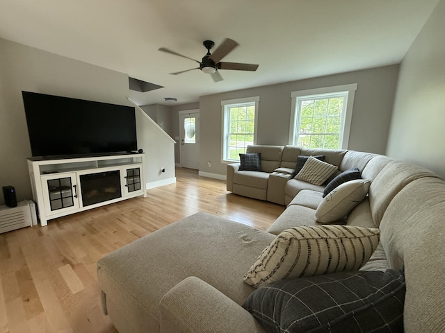 34 May Way, Sidney, ME 04330 - living room with wood finished floors and ceiling fan