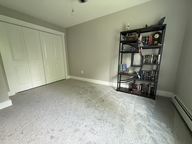 34 May Way, Sidney, ME 04330 - unfurnished bedroom featuring baseboard heating, carpet, and a closet