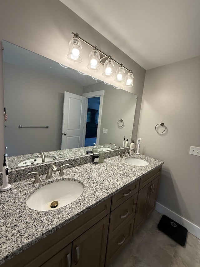 34 May Way, Sidney, ME 04330 - full bath with double vanity and tile patterned floors
