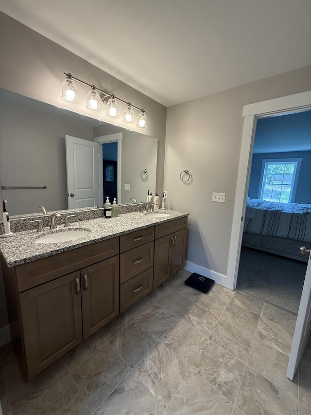 34 May Way, Sidney, ME 04330 - bathroom featuring double vanity and connected bathroom