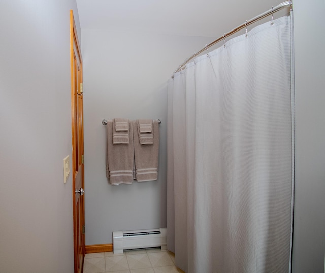 32 Ridge Rd, Marshfield, ME 04654 - bathroom featuring a baseboard heating unit and a shower with shower curtain