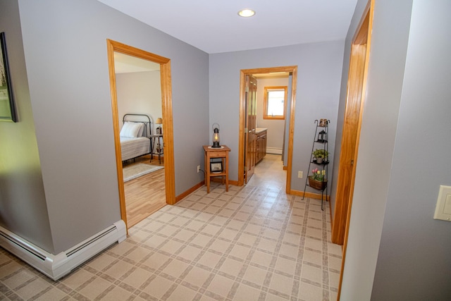 32 Ridge Rd, Marshfield, ME 04654 - corridor featuring a baseboard radiator, light flooring, and recessed lighting