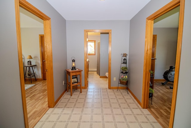 32 Ridge Rd, Marshfield, ME 04654 - corridor featuring baseboards and light wood-style flooring