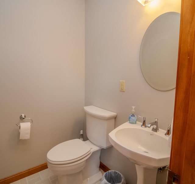 32 Ridge Rd, Marshfield, ME 04654 - bathroom with baseboards and toilet