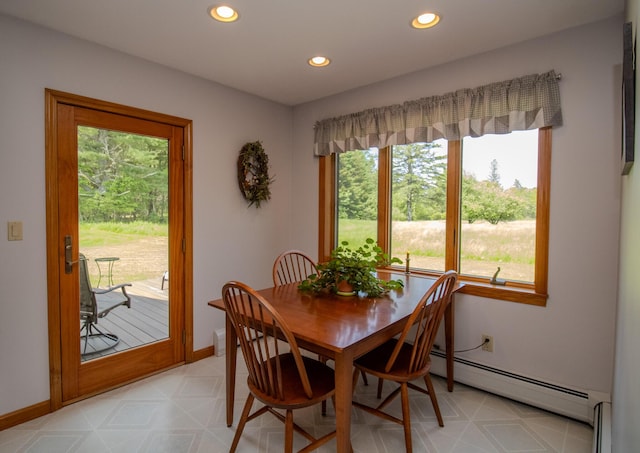 32 Ridge Rd, Marshfield, ME 04654 - dining space with a baseboard radiator, healthy amount of natural light, recessed lighting, and light flooring