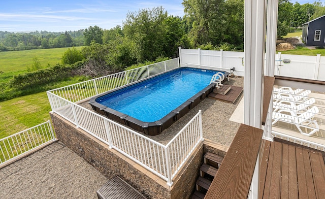 302 Canaan Rd, Hampden, ME 04444 - view of swimming pool featuring a fenced backyard and a wooden deck
