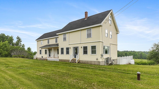 302 Canaan Rd, Hampden, ME 04444 - back of property featuring a chimney, a shingled roof, and a porch
