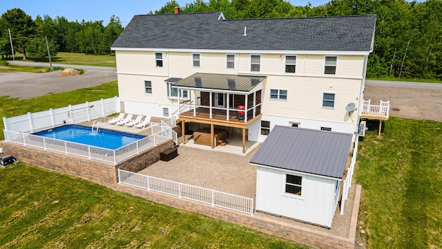 302 Canaan Rd, Hampden, ME 04444 - rear view of house featuring a hot tub, a fenced backyard, a patio area, a deck, and roof with shingles