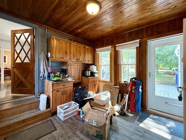 755 Main St, Calais, ME 04619 - miscellaneous room with wooden ceiling, wooden walls, and dark wood-style floors